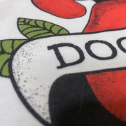 Close up of Dog Mom t-shirt, showing tattoo style design and smooth polyester fabric.