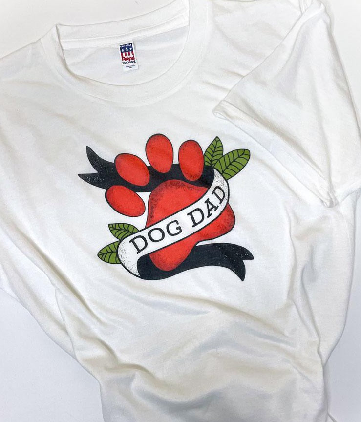 White t-shirt with Dog Dad Paw Tattoo Banner that reads DOG DAD