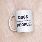 Coffee Mug side image, reads Dogs Are My Kind of People, with paw print