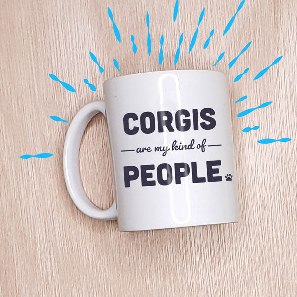 coffee mug that reads Corgis are my kind of people, with paw print; The Corgi Love Collection includes this mug for corgi lovers